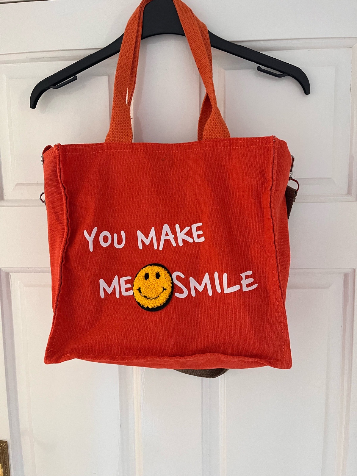 Orange smiley face shoulder bag, canvas