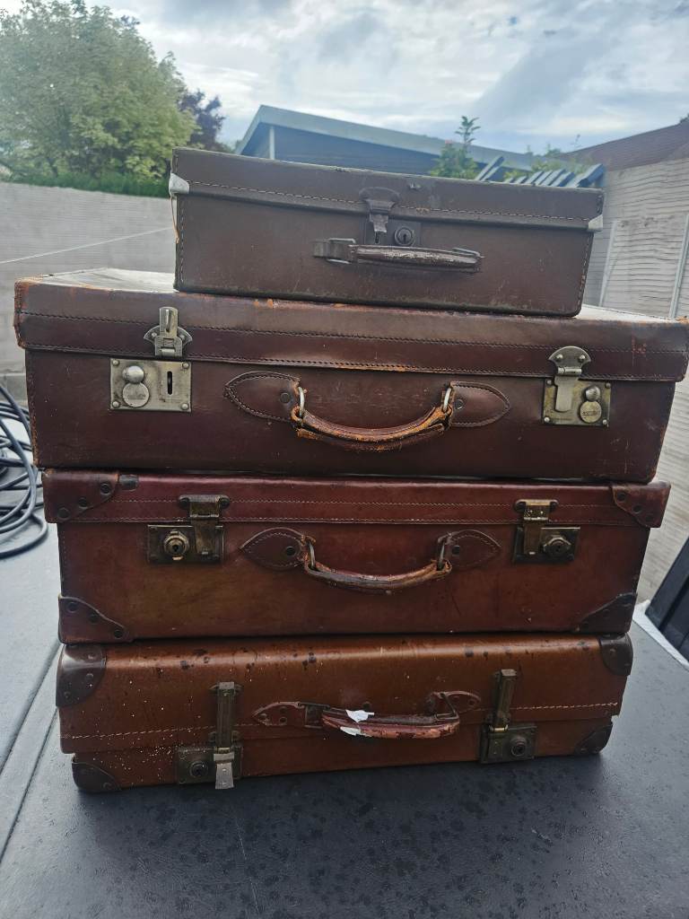 4x vintage brown suitcases