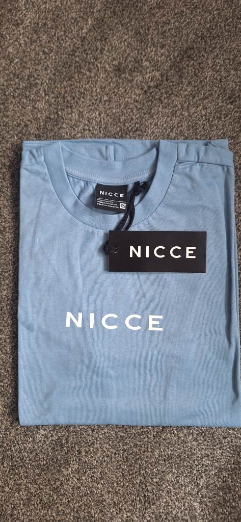 Nicce centre logo tshirt. Size x small. Allure blue. Brand new with tags