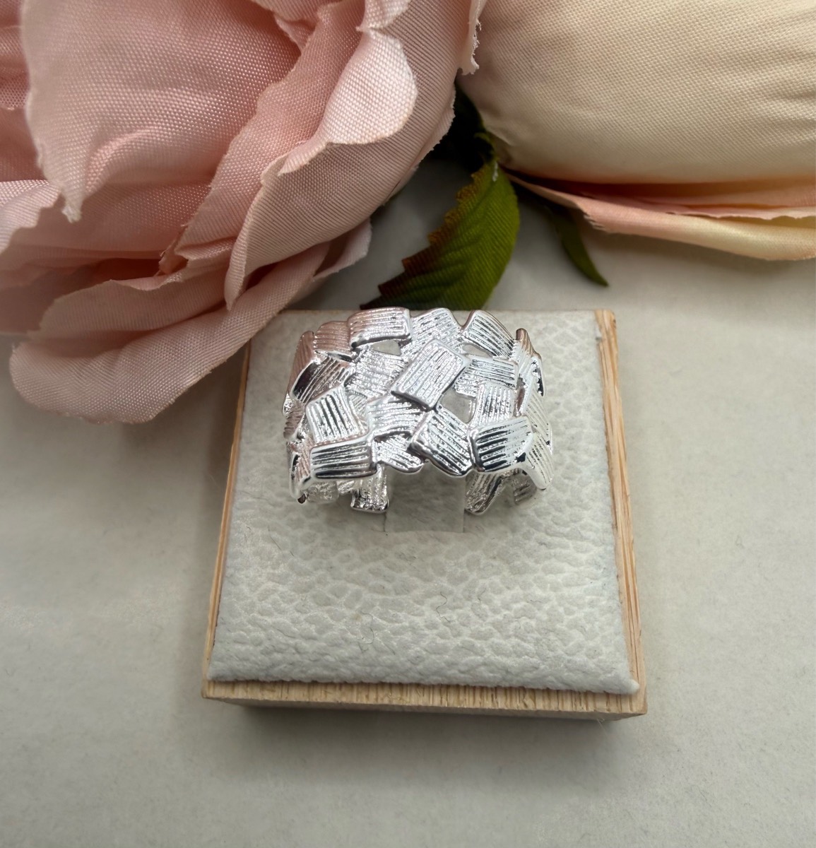 Sliver plated abstract ring
