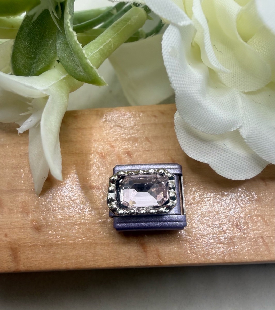 Lilac coloured crystal charm