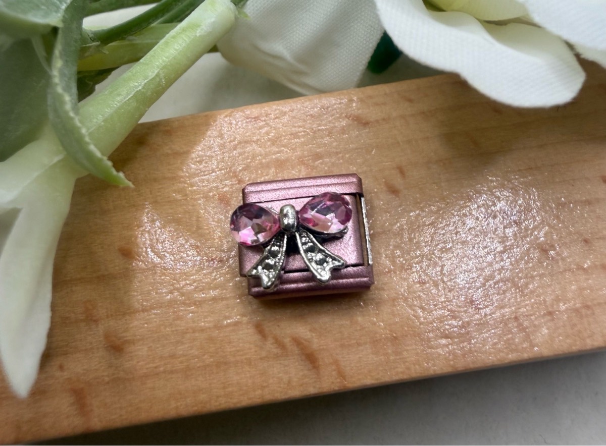 Pink coloured stainless steel Crystal Bow charm