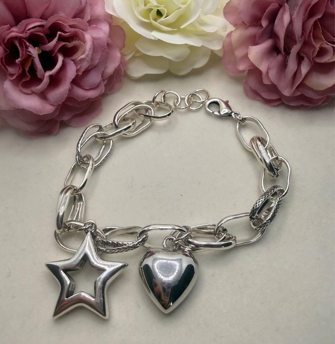 Sliver plated heart and star link bracelet