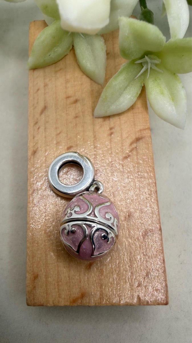 925 stamped sliver Faberge with hidden paw print charm