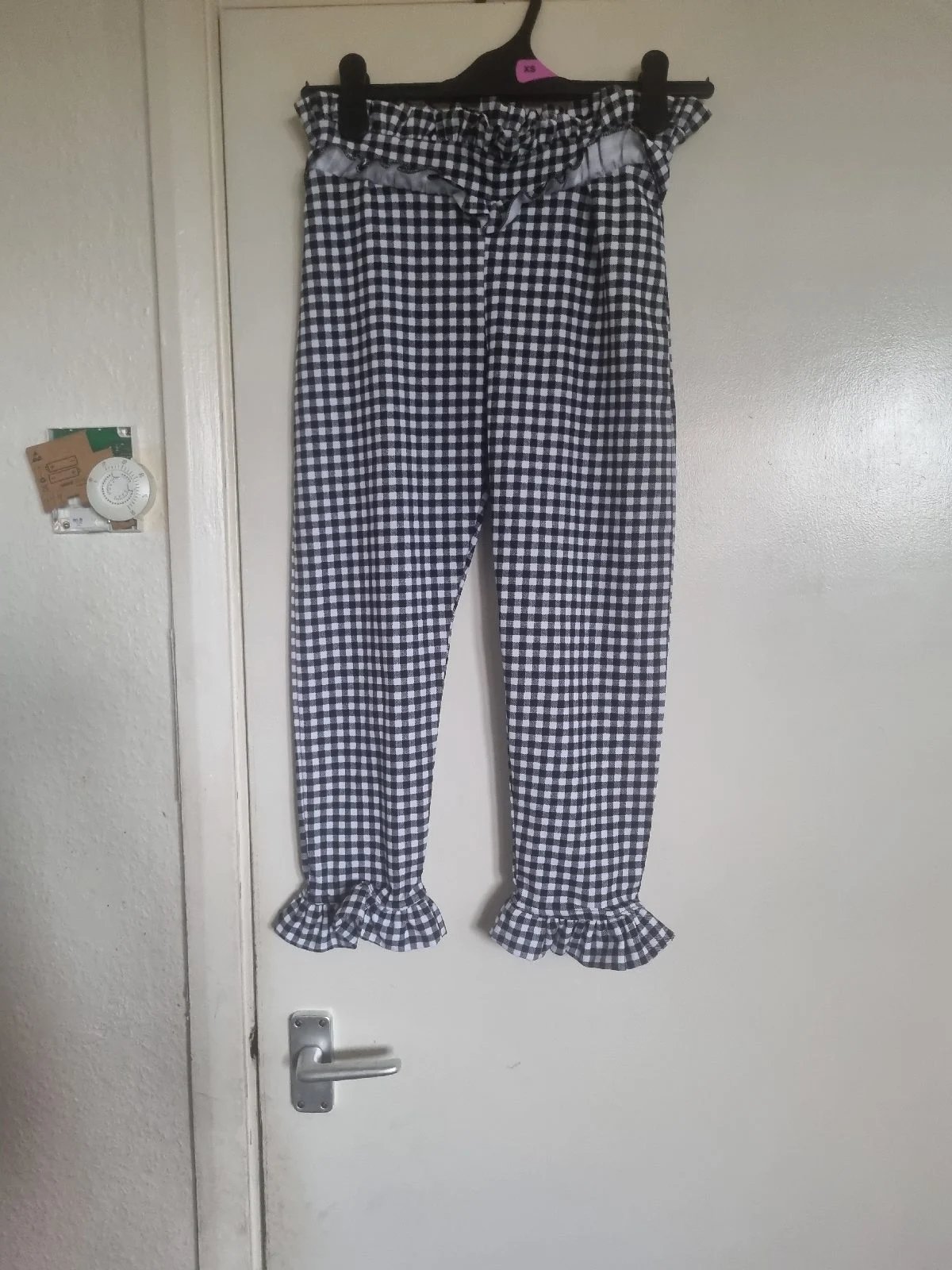 Women's pretty little thing crop frill black and white checkered trousers size 8