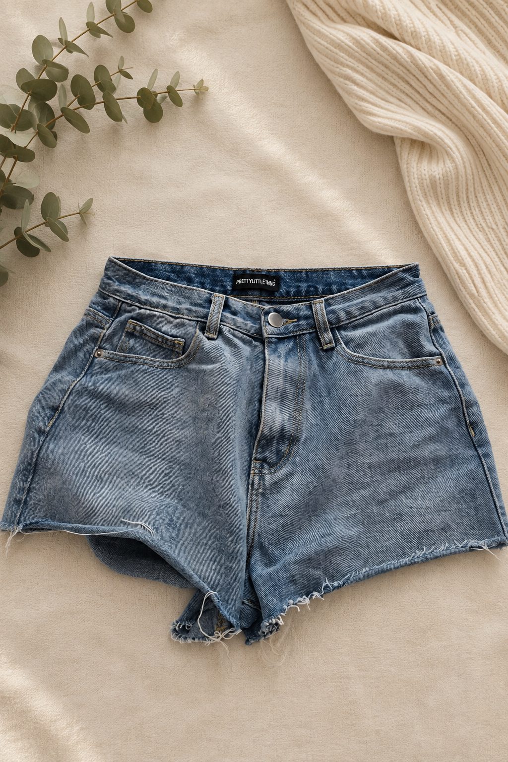 Cute PrettyLittleThing blue denim shorts in a classic washed denim finish