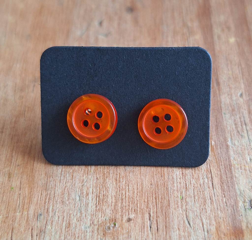 Orange button stud earrings