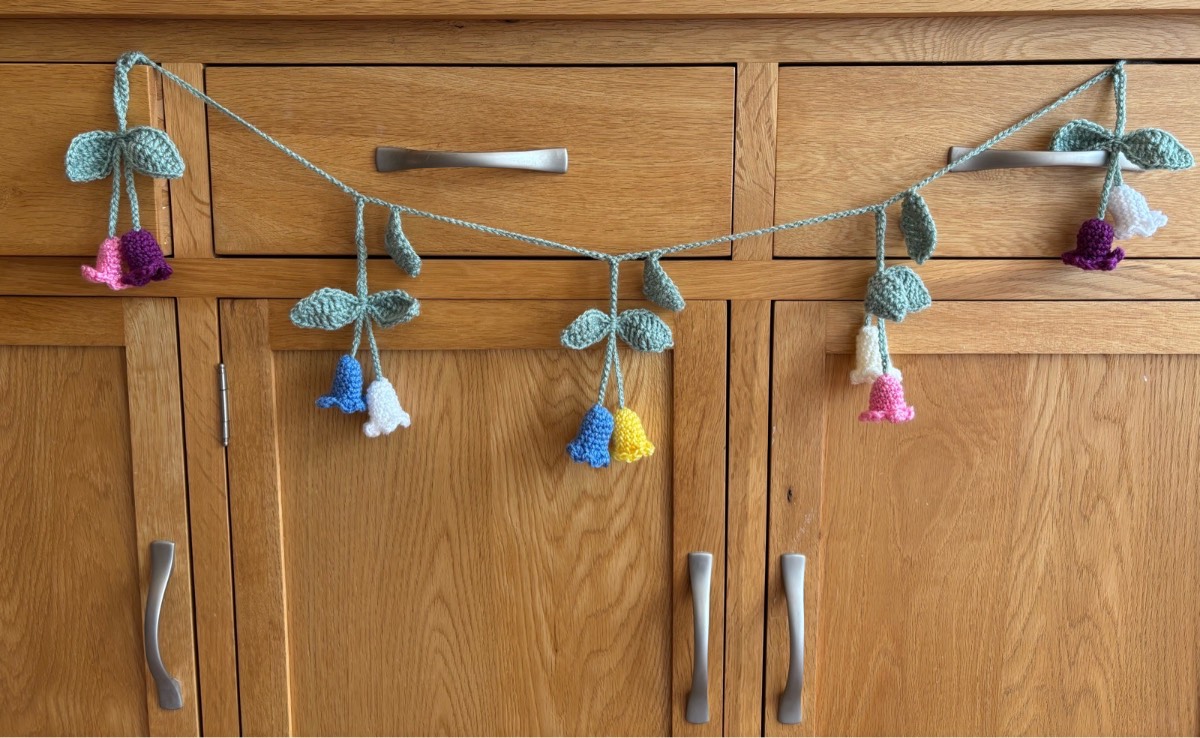 Handmade crocheted bell flower garland. Banner. Bunting. Decoration. Festival. Boho. Whimsy