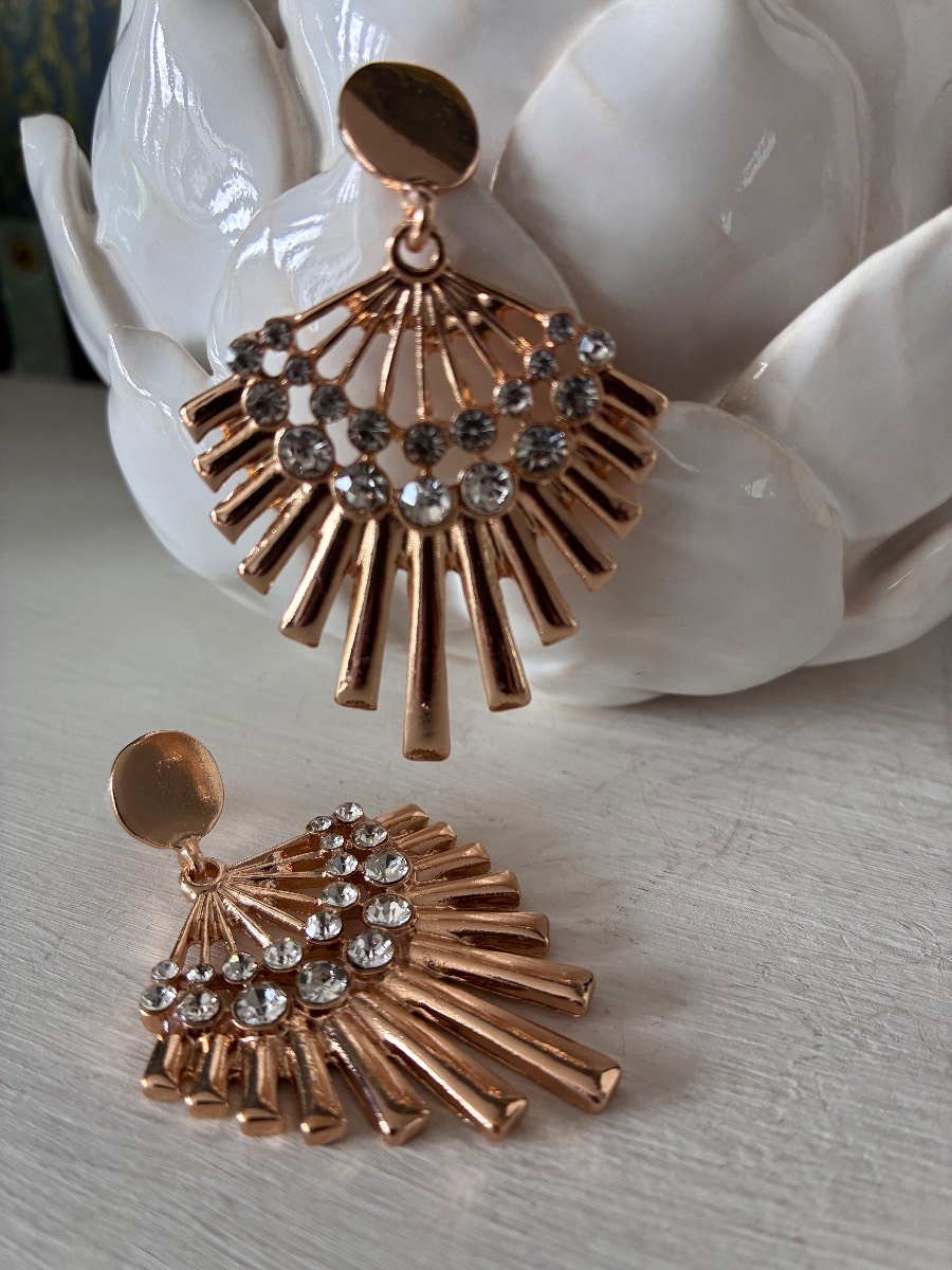 Large sunburst bohemian style gold tone earrings