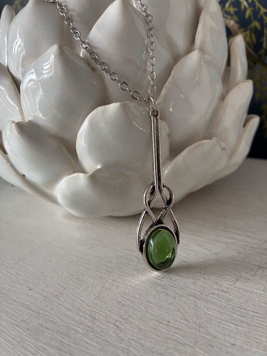 Art deco style long green glass pendant