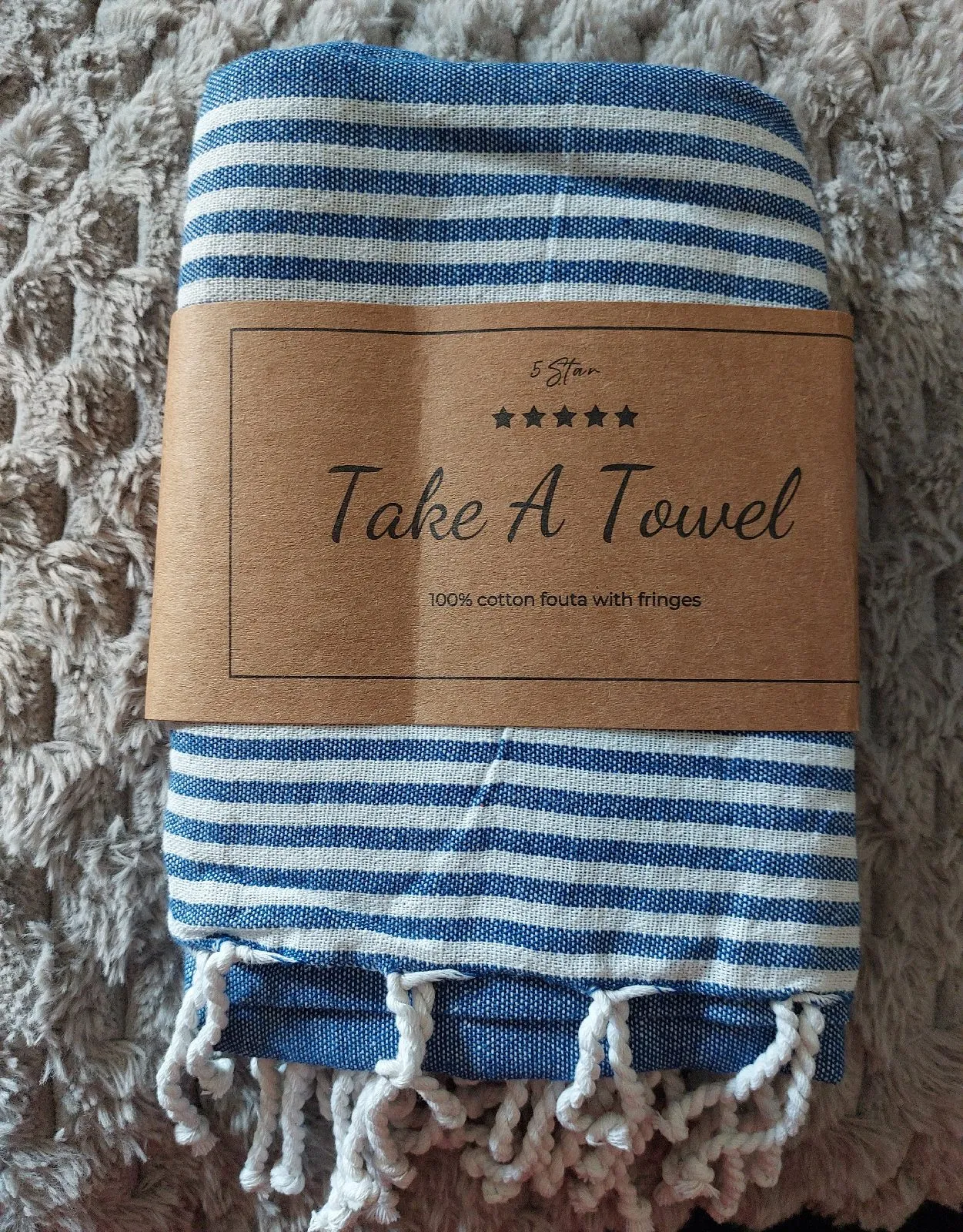 The 5 Star Take A Towel Blue Beach Towel is a luxurious polycotton towel perfect for summer days by