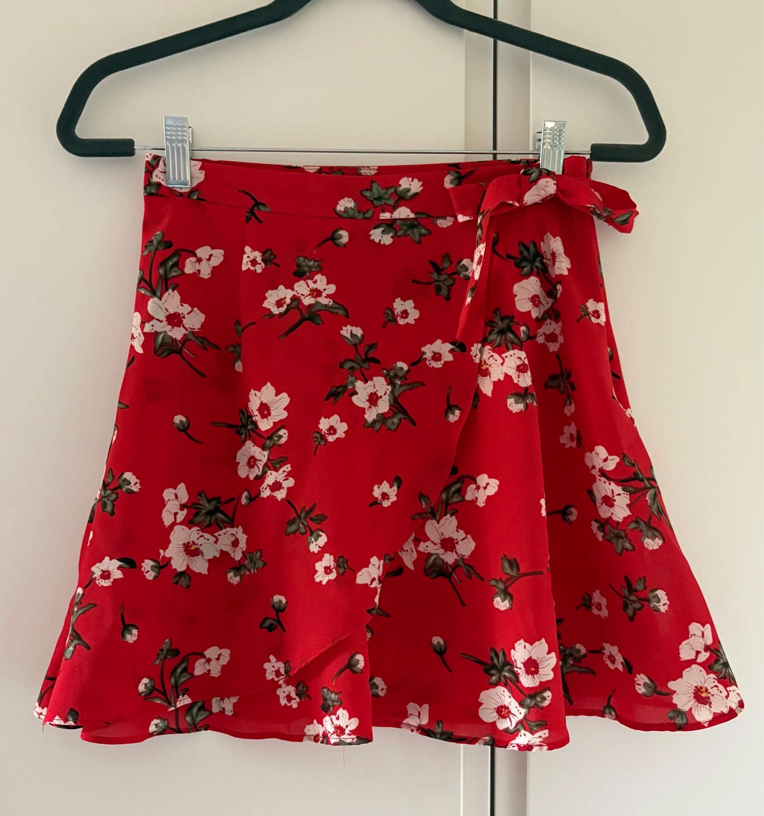 Red floral wrap style skirt. Size S Love & Other Things. Size