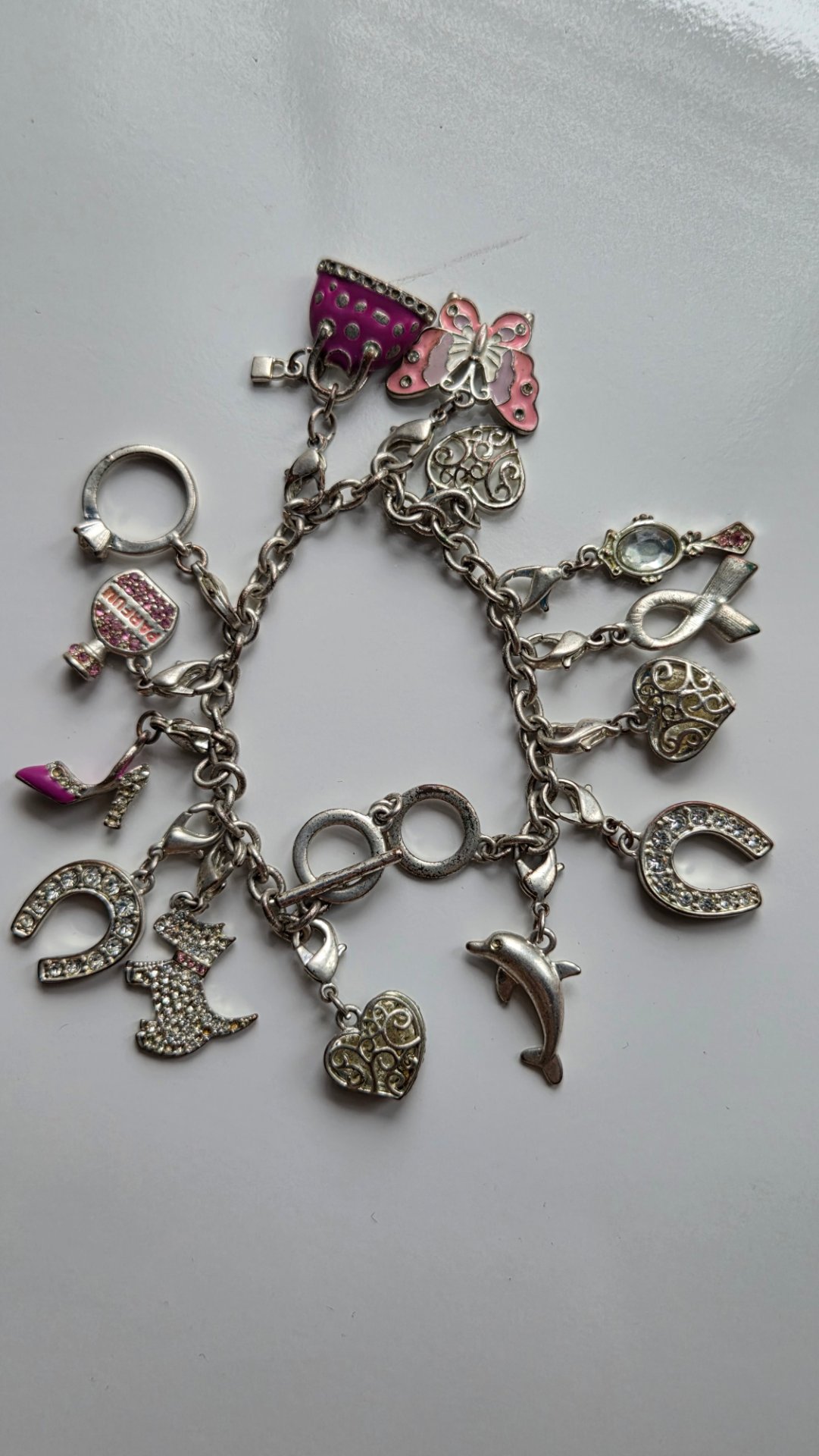 Silver Tone Charm Bracelet With Dolphin, Butterfly & Fashion Charms