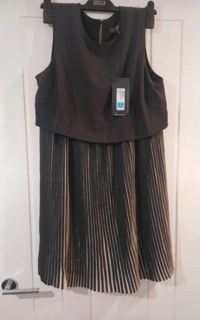 M&S women size 14 petite dress. Brand new with tag.