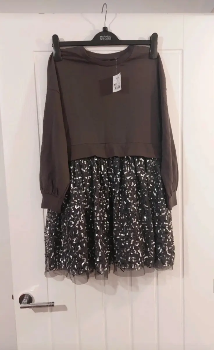 Next girls size 9 years dress. Brand new with tag