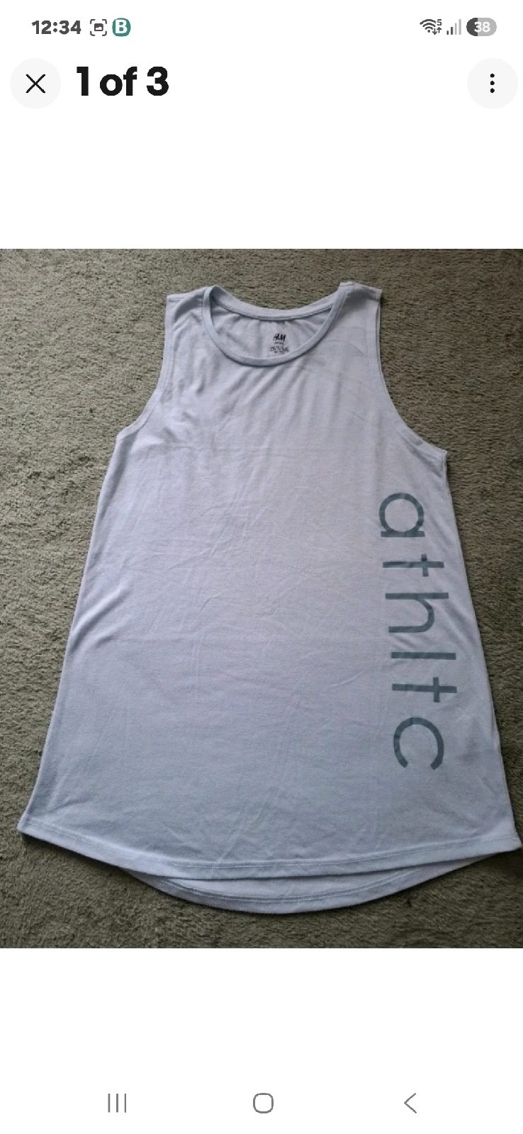 H&M athletic ladies light blue/white logo'd modern vest top size xs or 8 approx