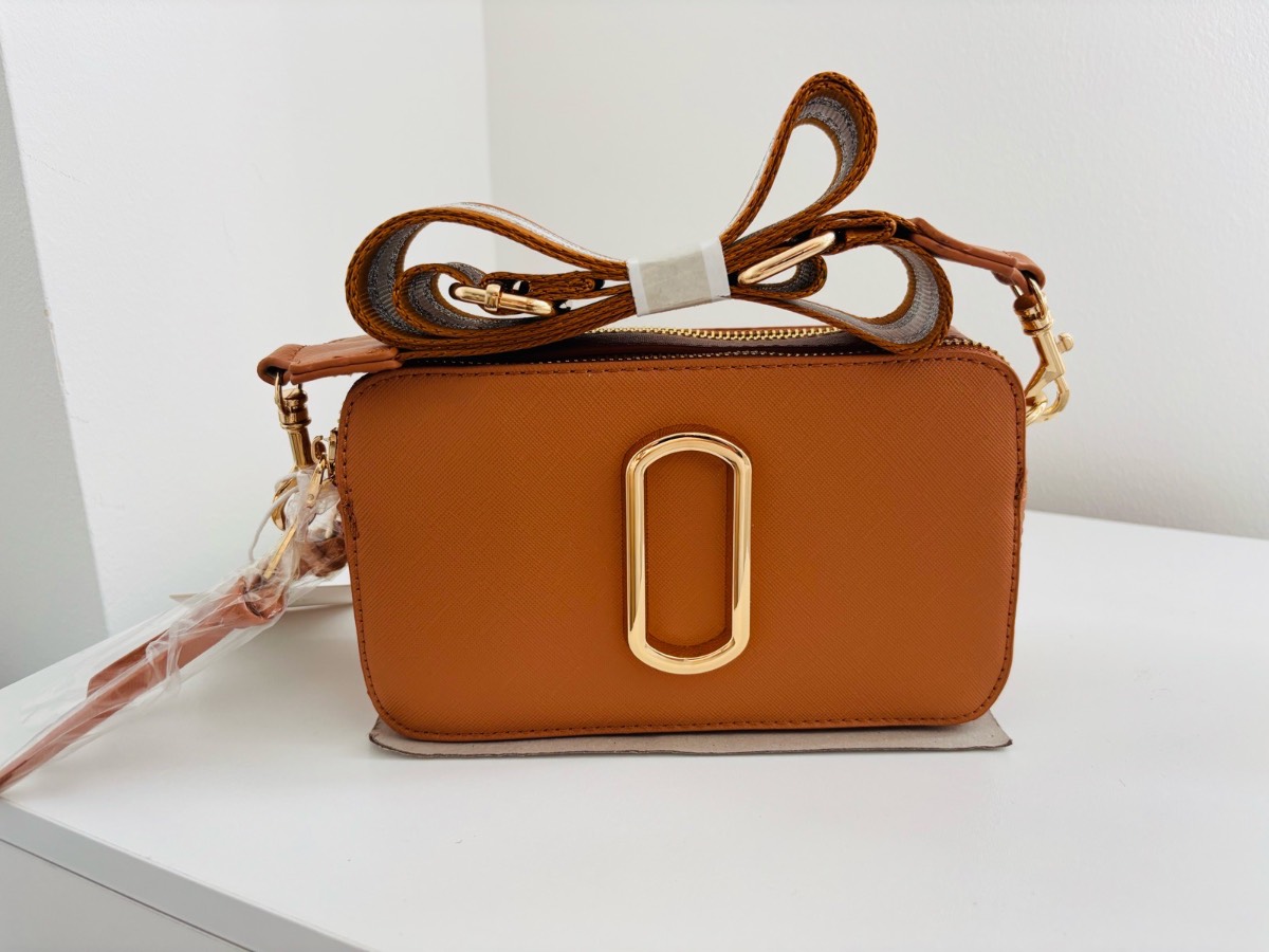 Women’s brand new tan crossbody bag