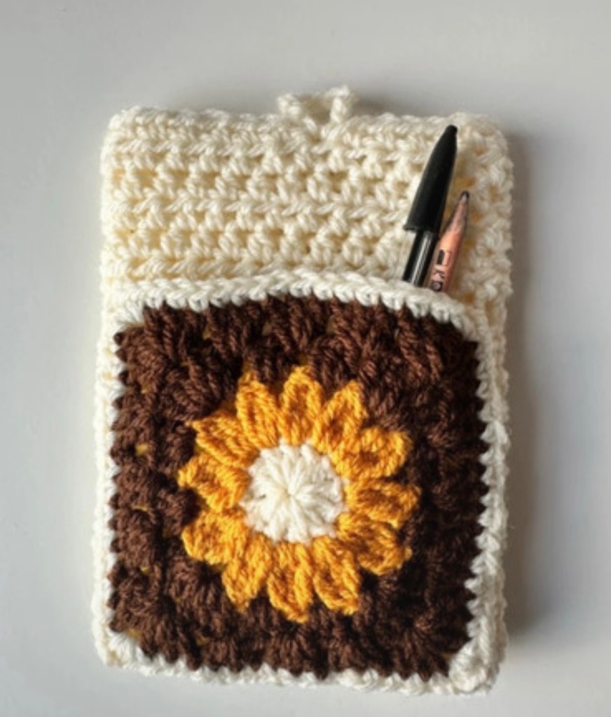 Handmade crochet kindle/ e-reader sleeve with pocket