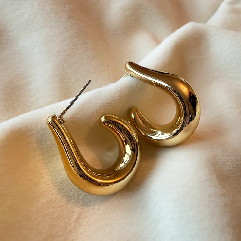 gold tone chunky teardrop hoop earrings sculptural open hoop earrings statement polished earrings
