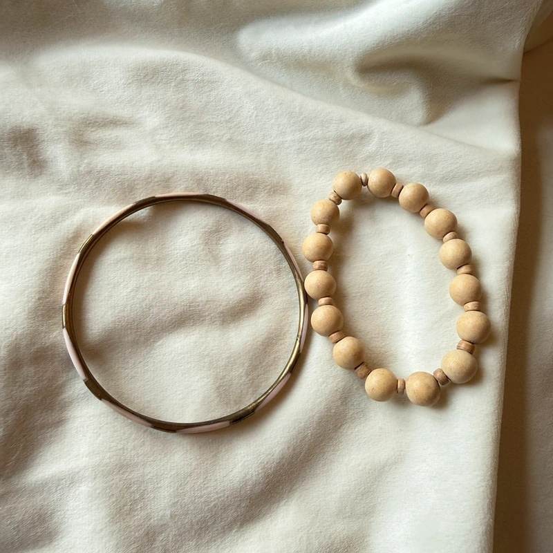 set of 2 bracelets one wooden and one metal