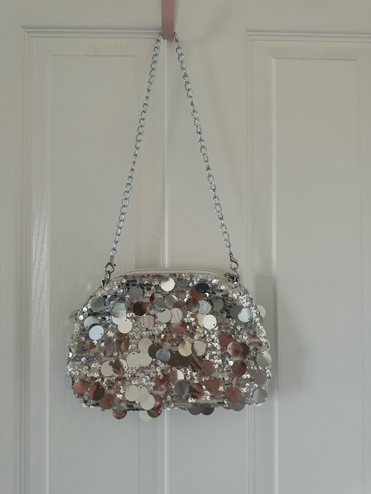 New silver glittery handbag with removal strap