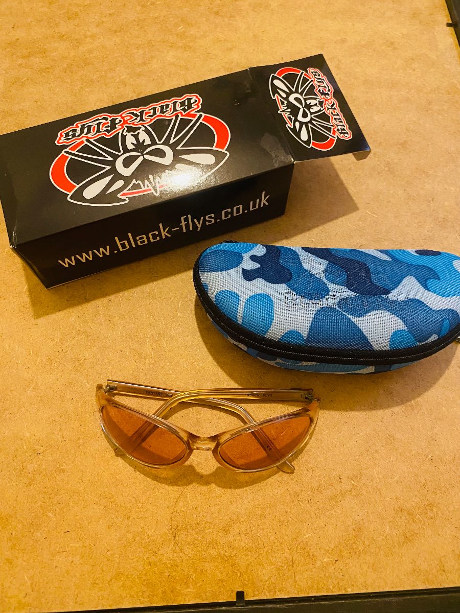 Black flys pink and clear sunglasses