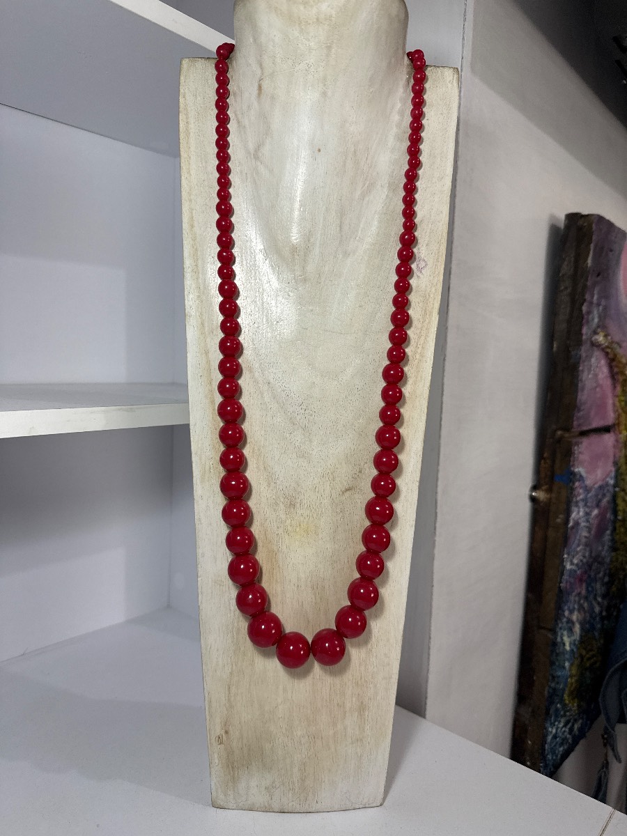 Long red bead necklace