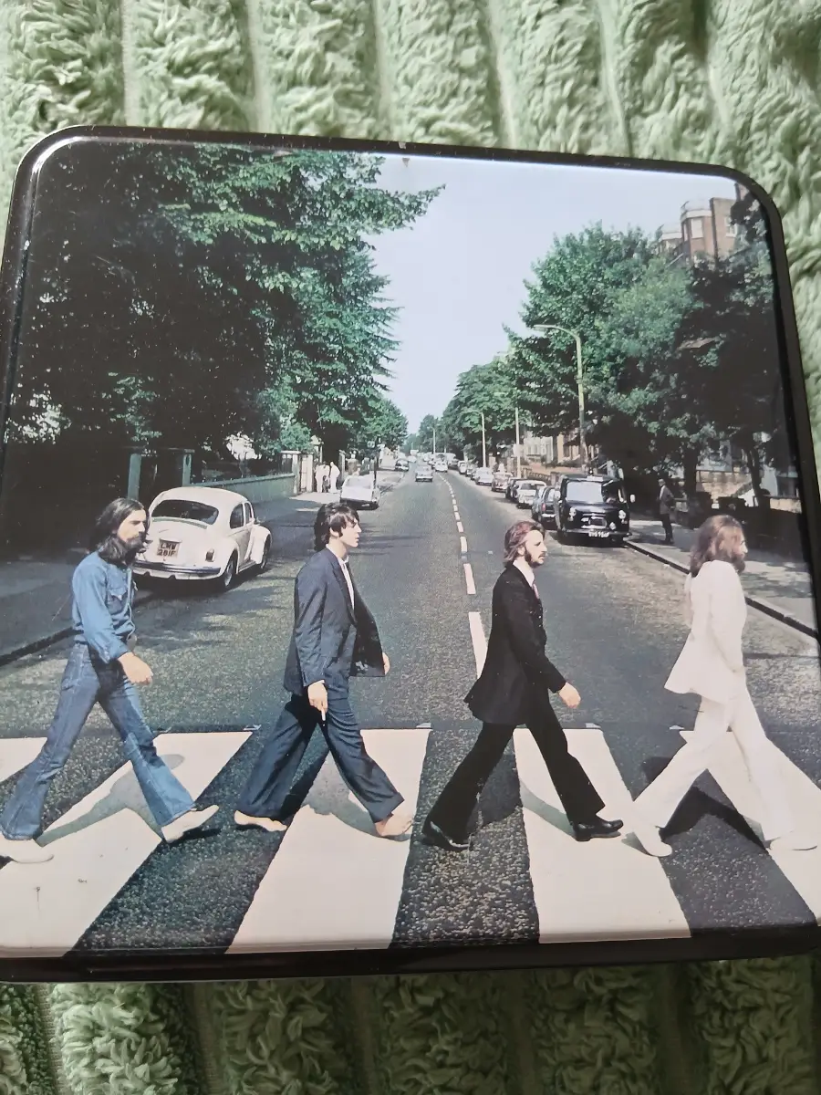 The Beatles jigsaw in a tin 2003.