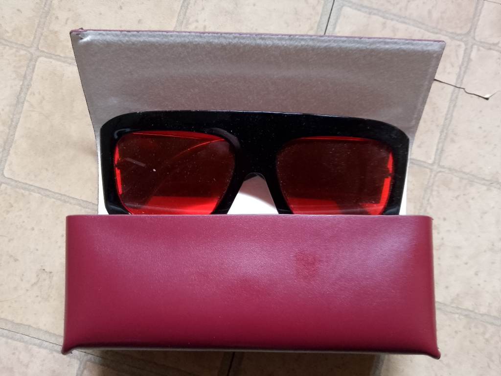 Burgundy leather sunglass case with cream lining (glasses not included )