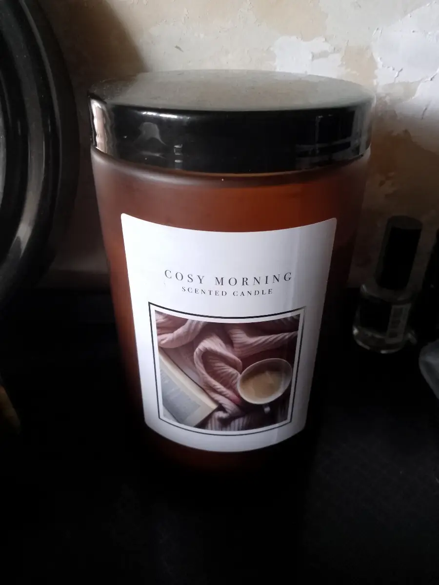Cosy Morning scented candle in an orange glass jar with screw top lid
