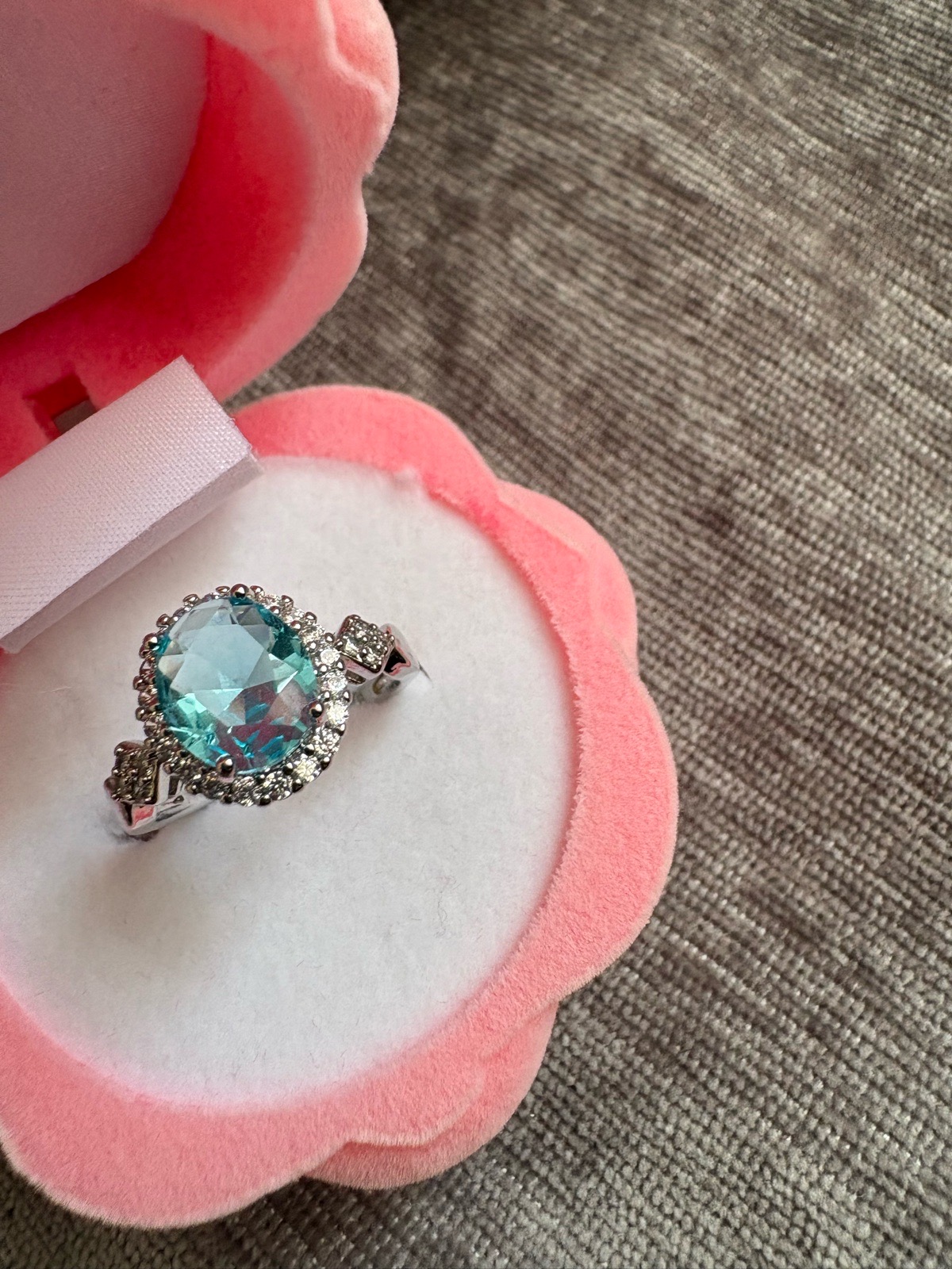 Silver ring in flower basket box