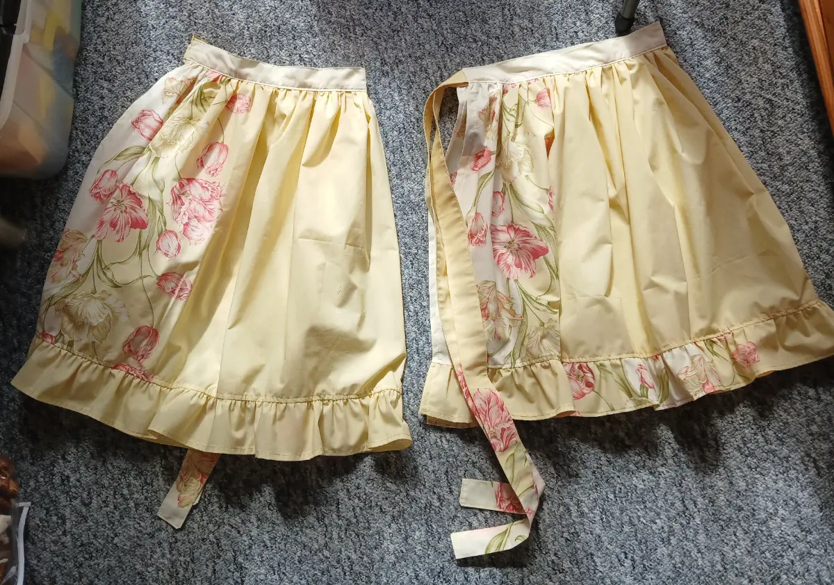 matching pair of waist aprons with ruffles