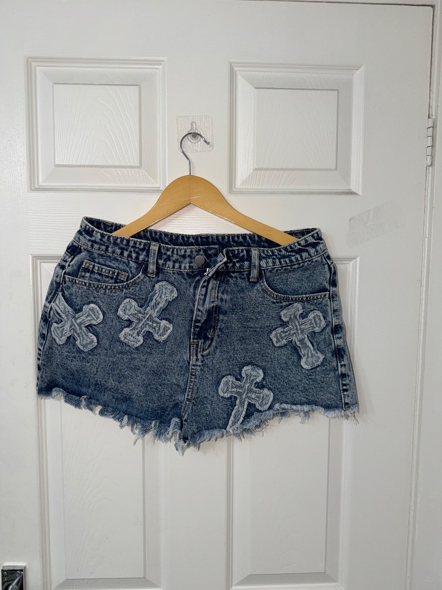 Cross design jean shorts