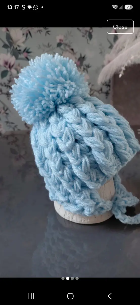 Handmade baby boys pom pom hat in blue colour