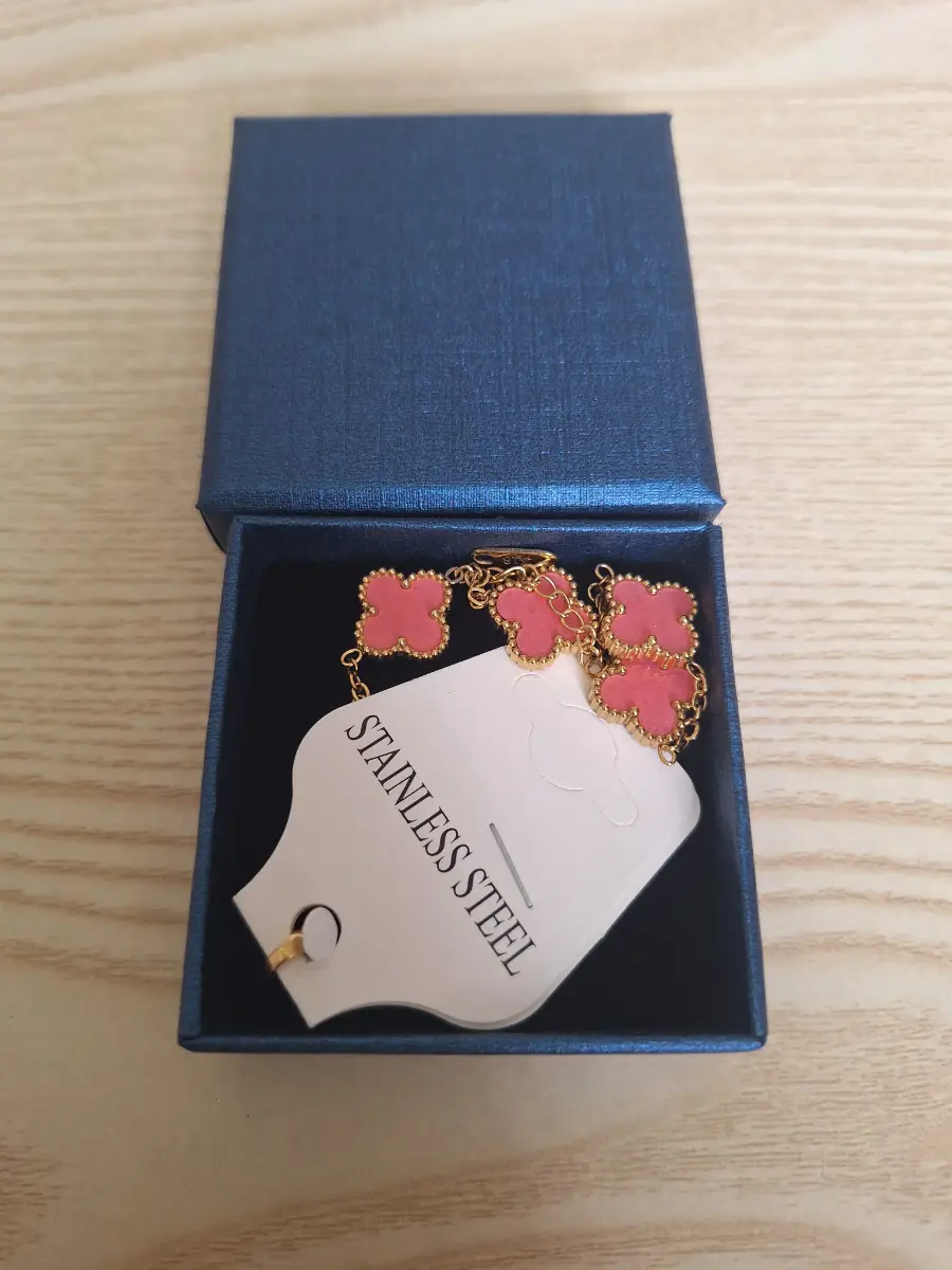 Gorgeous pale pink and gold clover bracelet new in gift box