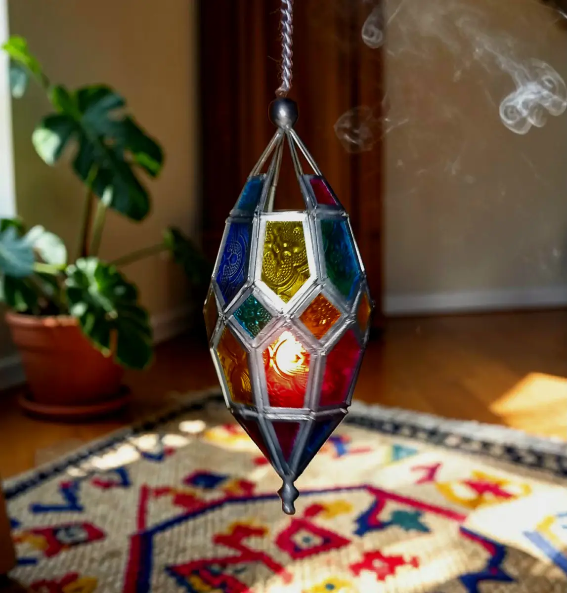Colourful glass tealight holder