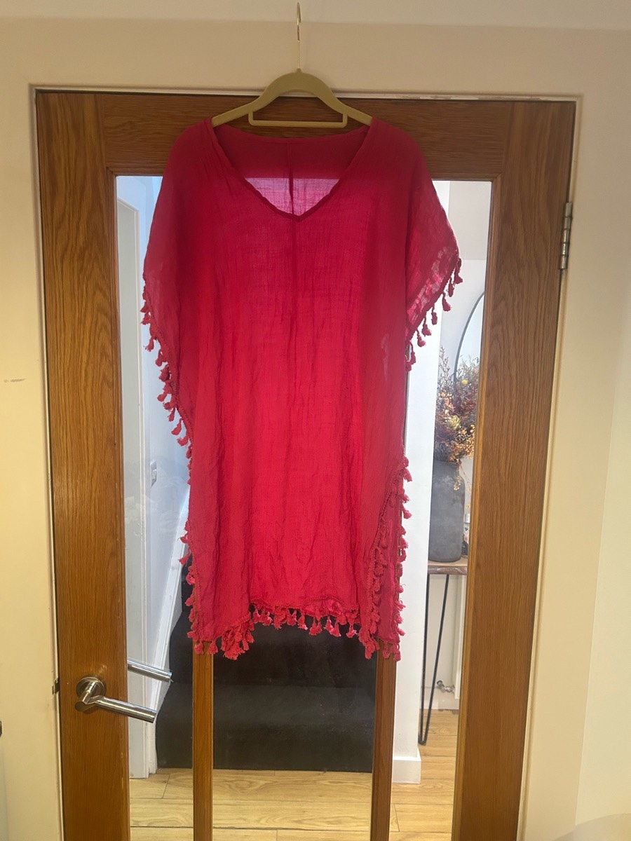 Women’s beach cover. Size L