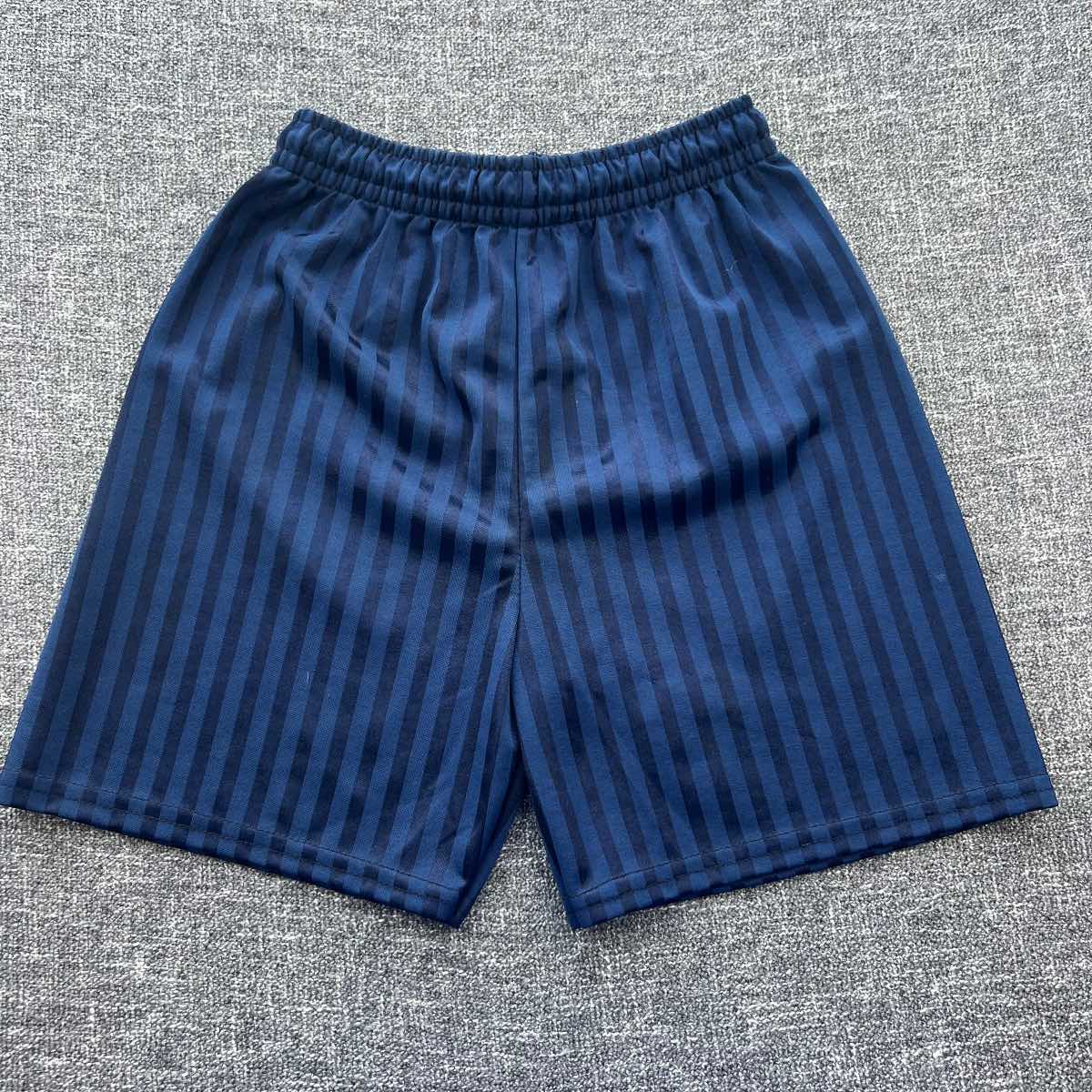 Boys 7-8 year blue football style PE shorts