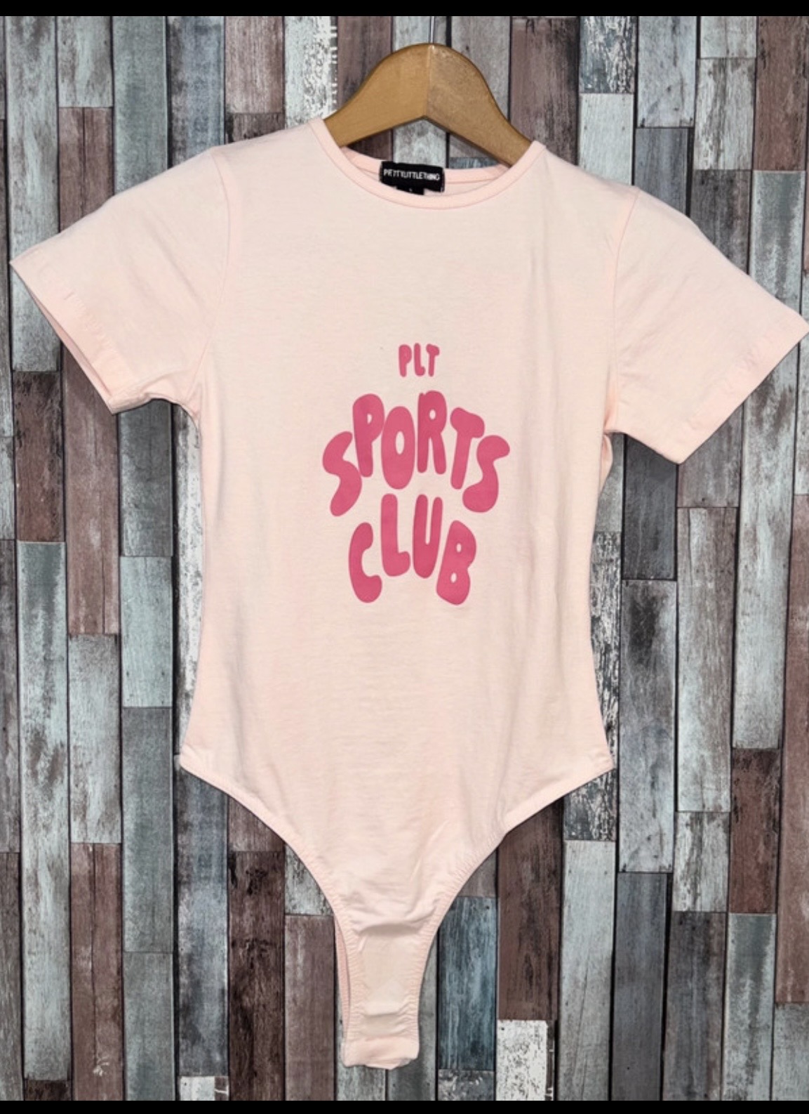PrettyLittleThing Baby Pink Logo Short Sleeved Bodysuit (small)