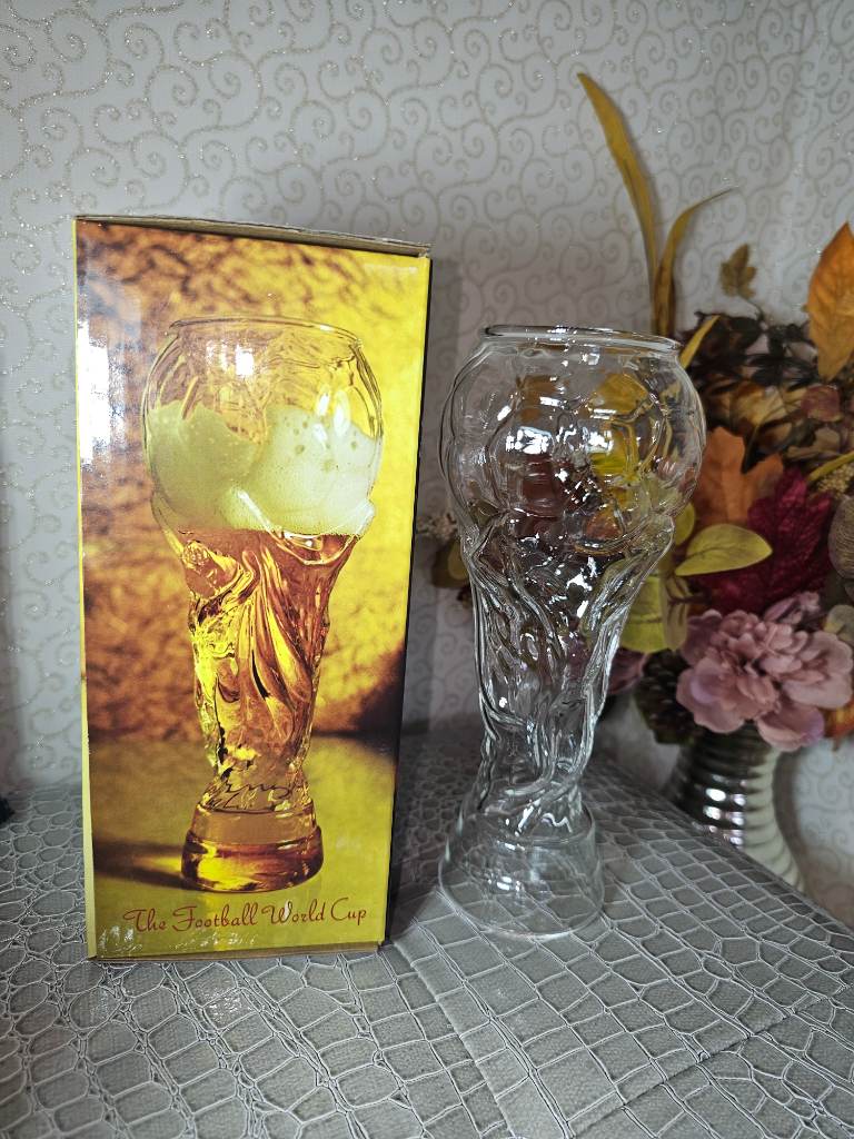 Glass in the shape of football world cup