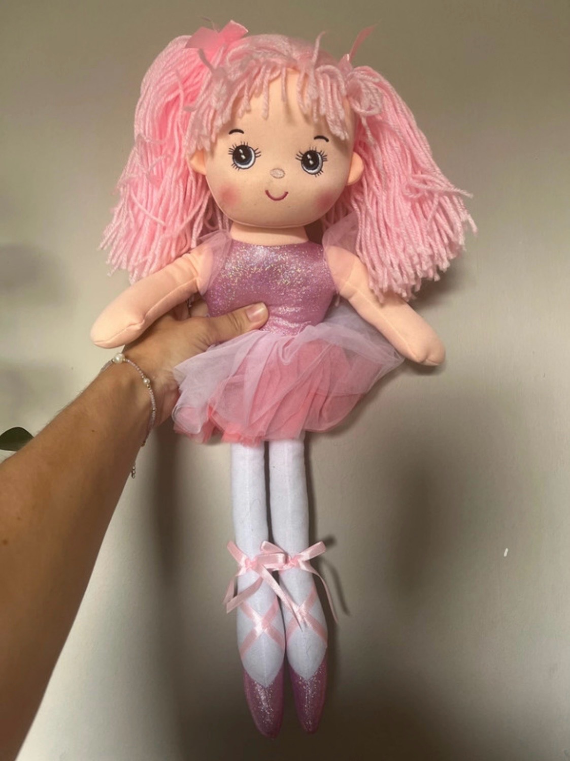 Child’s pink soft doll