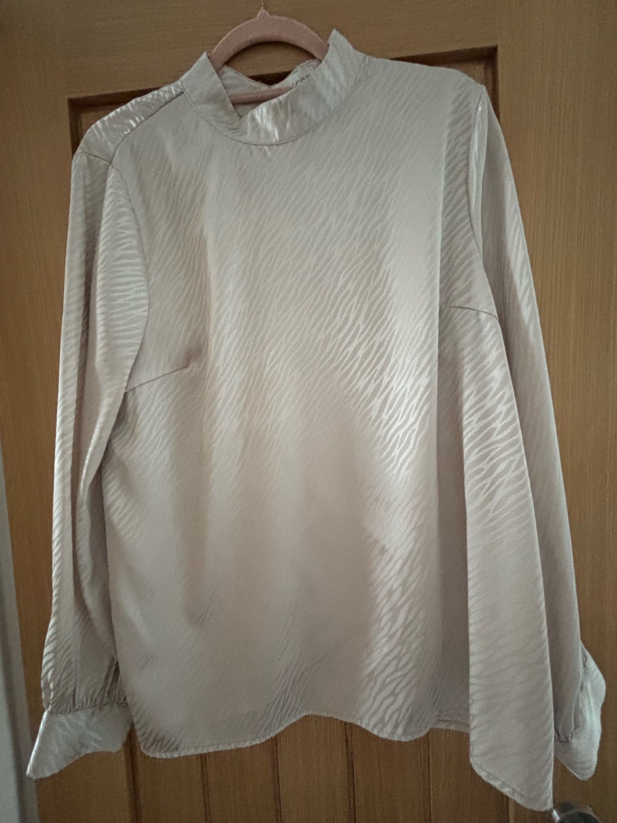 🤍 Apricot Cream Textured Blouse – High Neck & Statement Cuffs