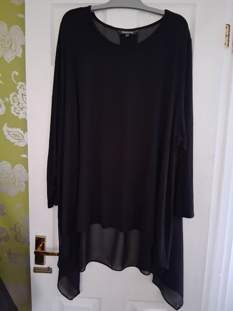 Elegant black long sleeved evening top