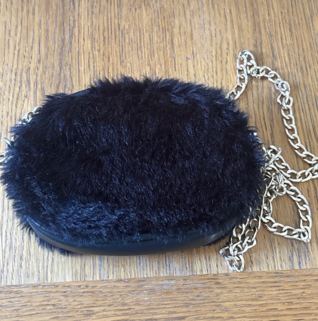 Black furry bag