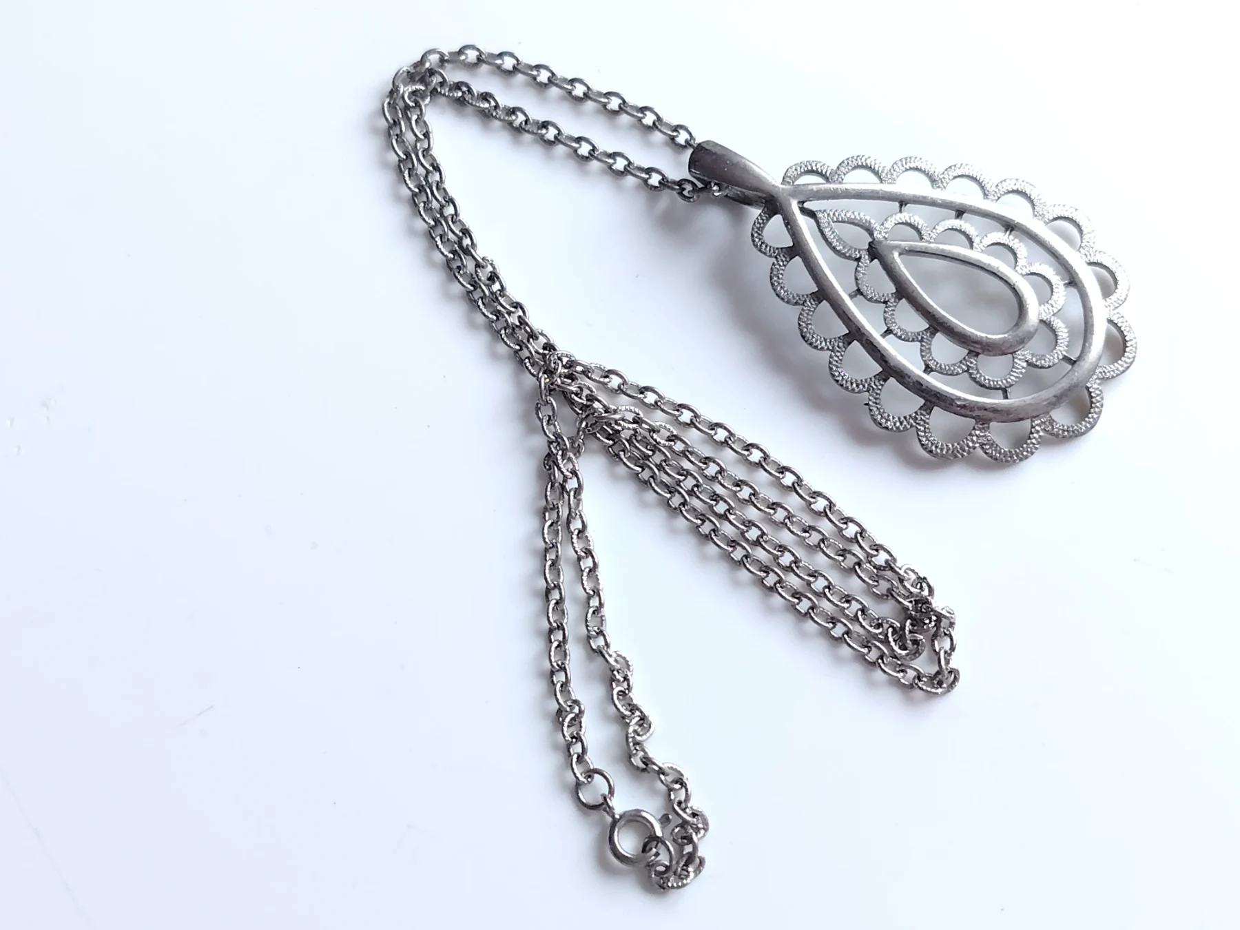 Silver tone modernist style metal abstract pendant necklace