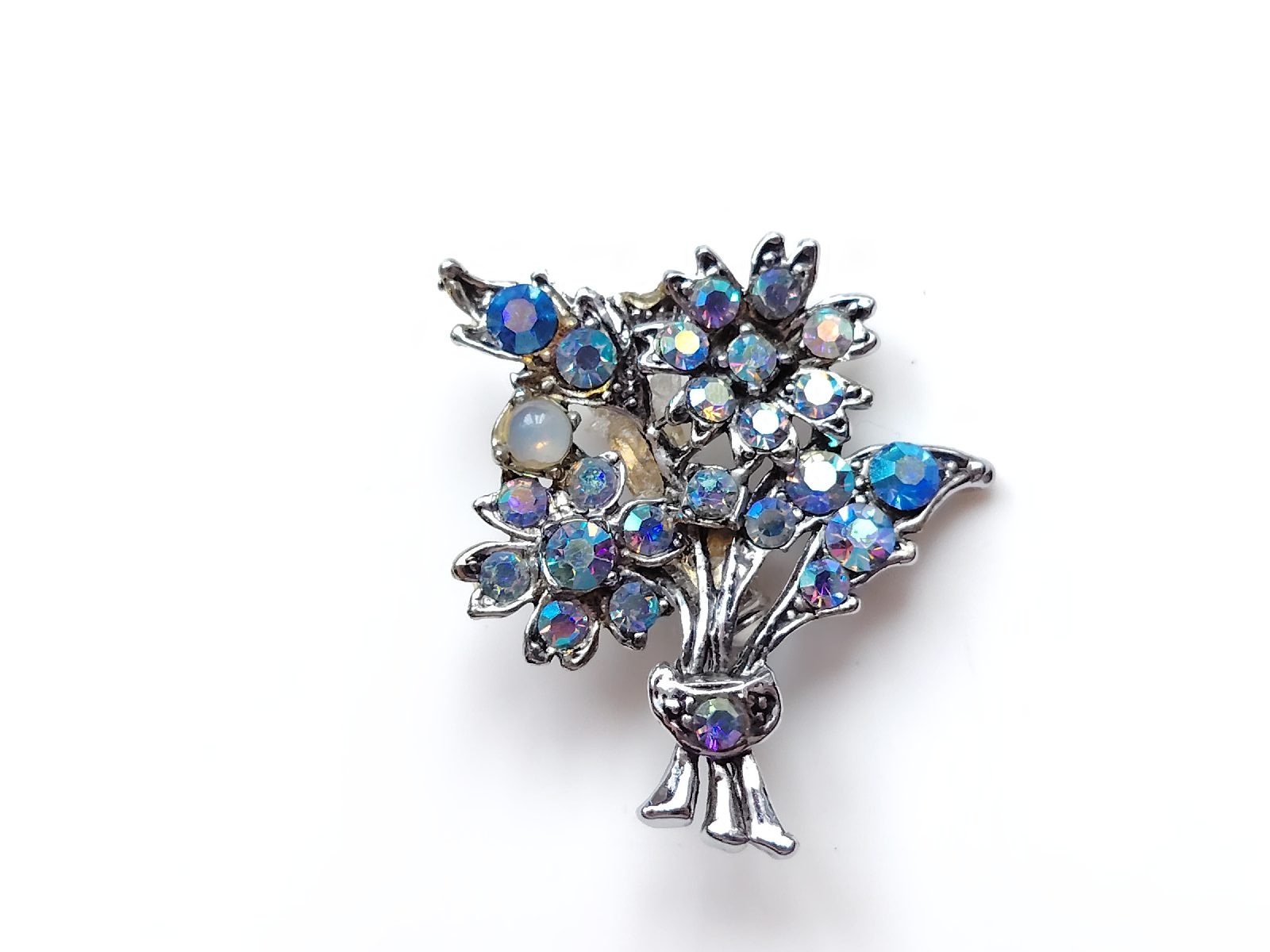 Silver tone blue rhinestone floral spray flower brooch