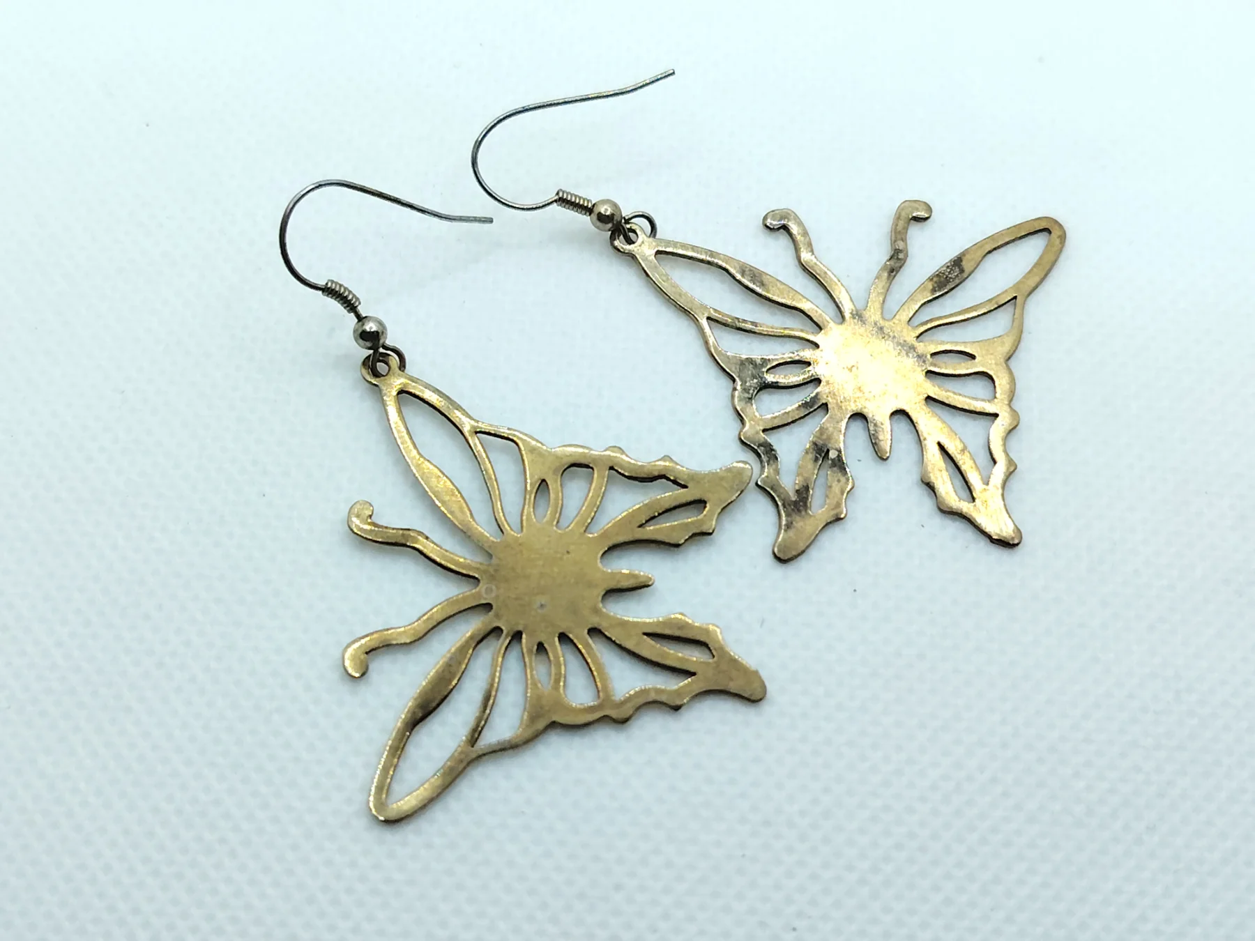 Gold tone metal drop dangle earrings butterflies butterfly