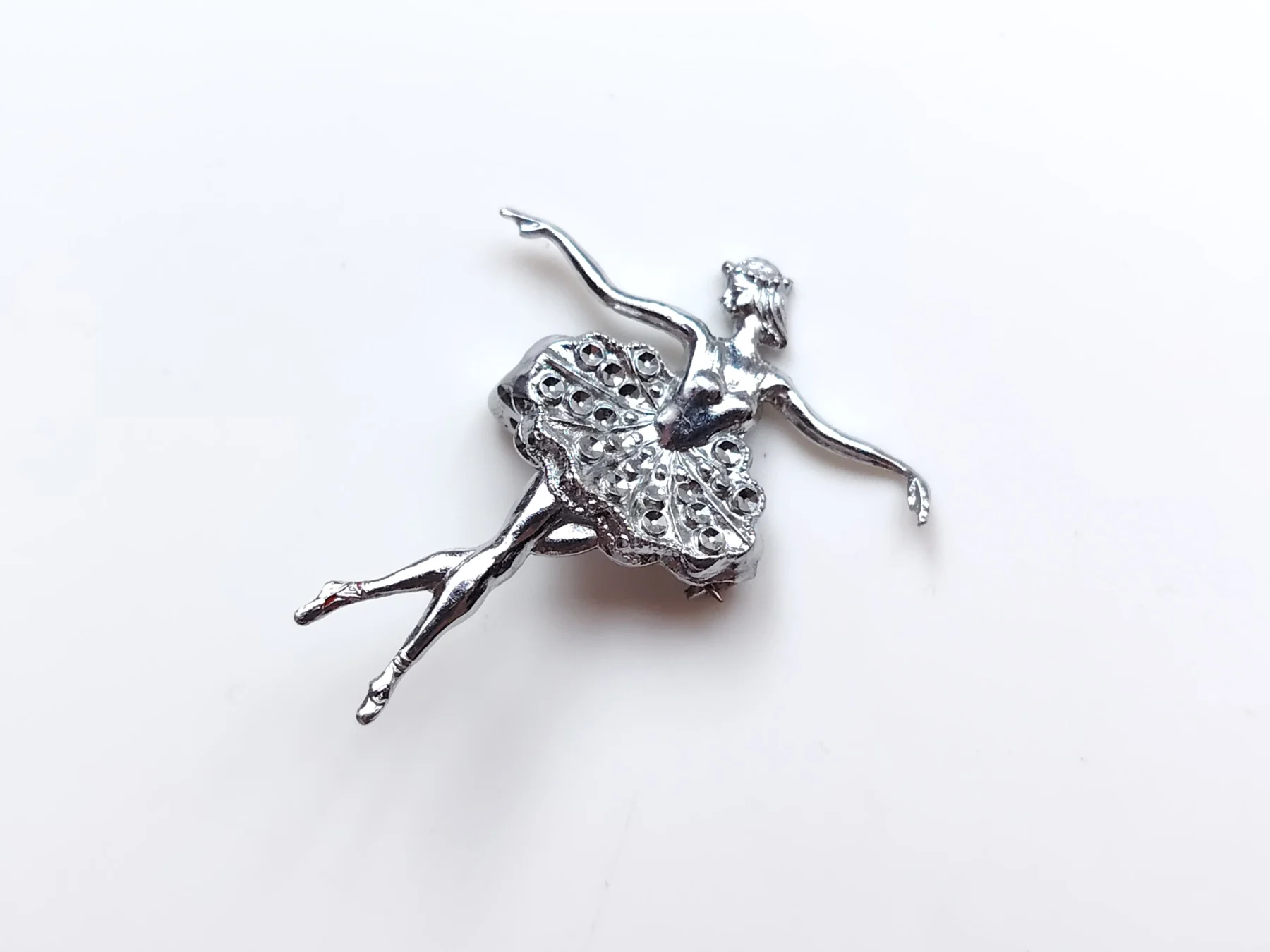 Silver tone metal faux marcasite ballerina brooch