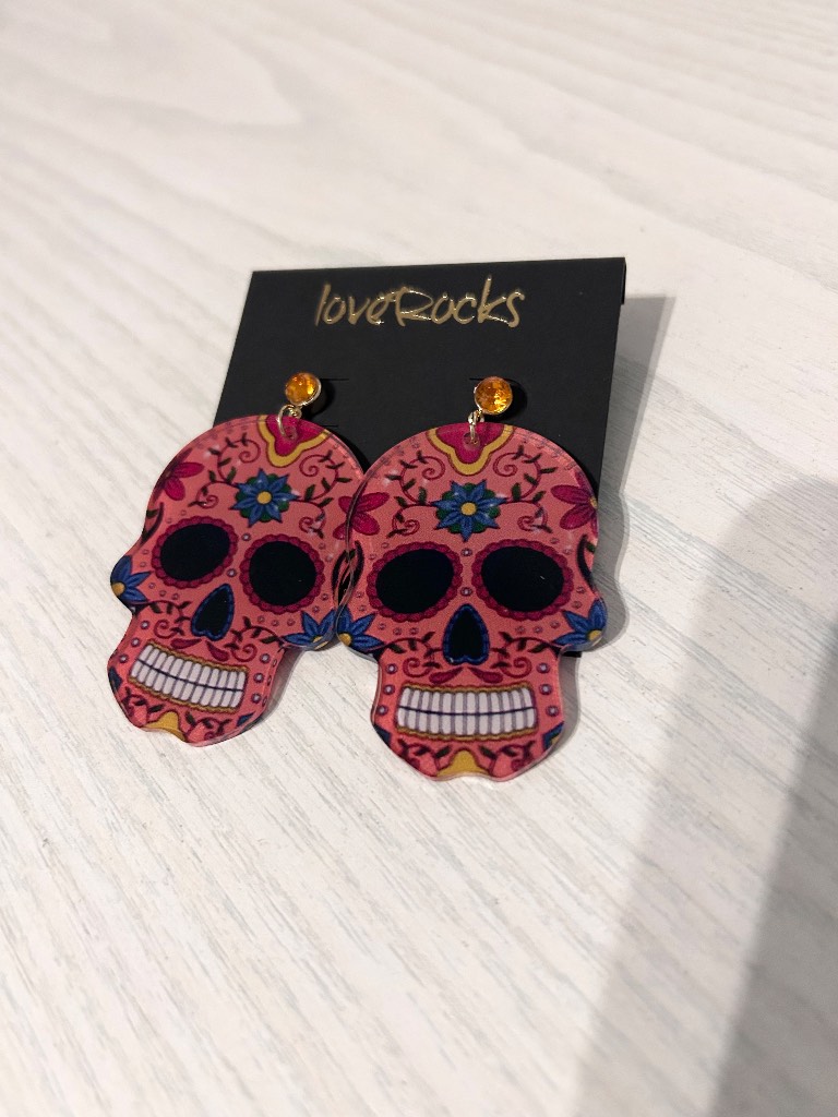 Love Rocks skull earrings.  New.