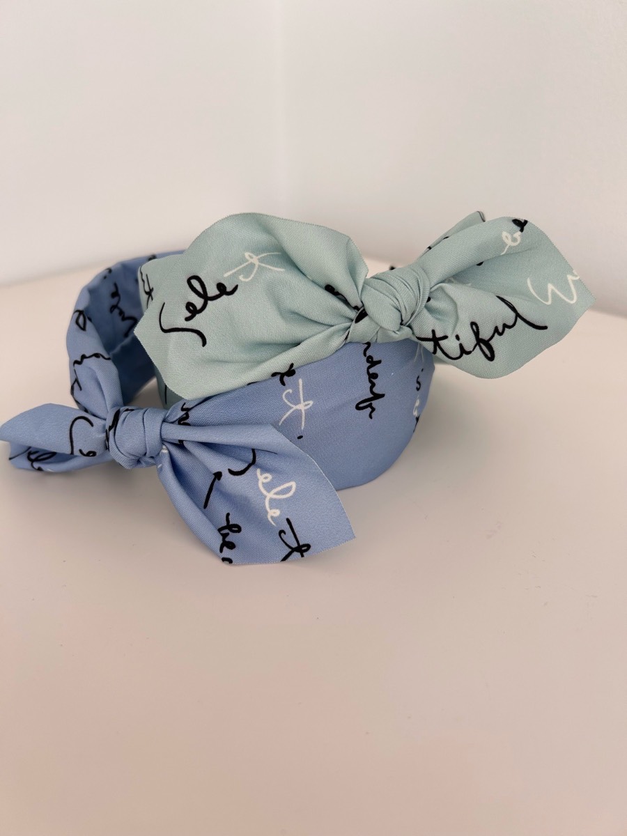 Girls Blue & mint script written bow headbands x2